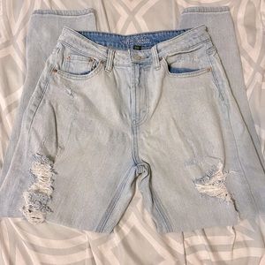 Light wash, straight leg distressed  jeans.